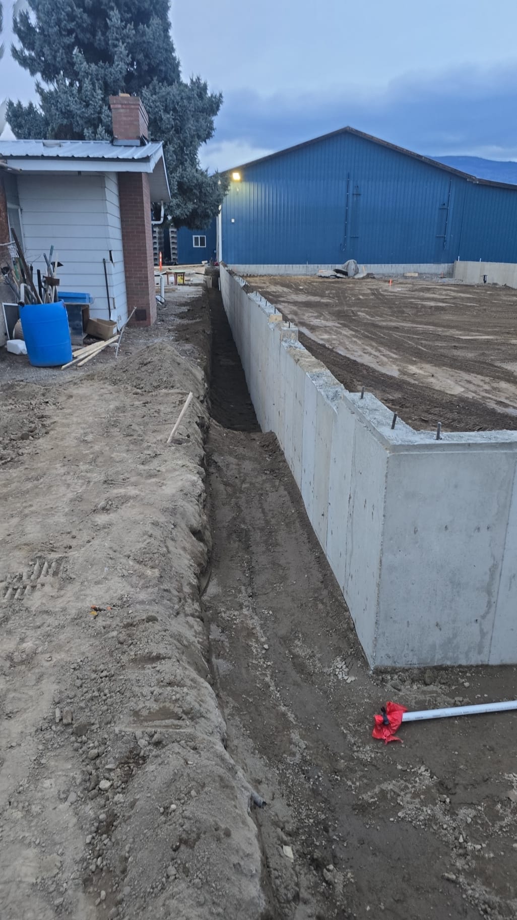 Commercial concrete retaining wall at night in South Okanagan